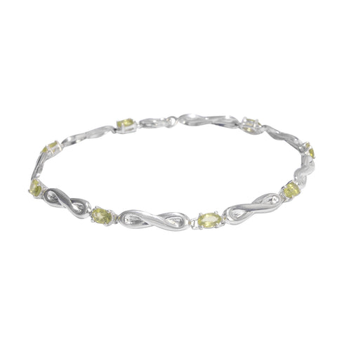 Rhodium Plated Bracelet Fashioned In Sterling Silver With Peridot  Stones - Fashion Apparel 