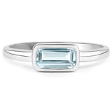 Rhodium Plated Sterling Silver Ring With Polished Blue Topaz. - Fashion Apparel 